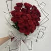 25 long stamp red roses with white wrap 