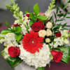 A beautiful mix of hydrangeas, gerbera daisy, snap dragons, roses, spray roses
