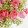Beautiful roses mixed with green foliage make for a stunningly striking cut