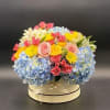 Flower mix with hydrangea and roses in a hat box ( we