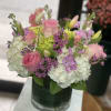 Classic and Beautiful, this large arrangement whispers luxury. Soft pinks, whites and