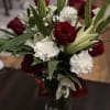 A vision of love! This luxe bouquet of fragrant white lilies and