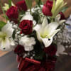 A vision of love! This luxe bouquet of fragrant white lilies and