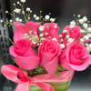 Short flowers and small vase 