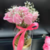 Short flowers and small vase 
