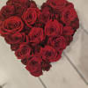 This heart shapped box is filled with 28-30 roses, and 15 spray