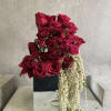 A timeless romance reflected in every petal&mdash;lush red roses arranged in a