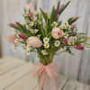 Beautiful display of assorted tulips designed  to make your someone special