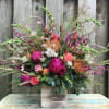 A burst of colorful blooms and textures gathered in an wild garden