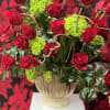 A captivating arrangement of rich red roses and soft hydrangeas, with delicate