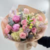 Delicate, romantic, and elegant, this bouquet is a stunning arrangement of soft