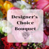 Let our expert designers choose a selection of flowers to create a