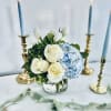 TULIPS MAY BE SUBSTITUED WHEN NOT IN SEASON*

This floral arrangement is a