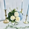 TULIPS MAY BE SUBSTITUED WHEN NOT IN SEASON*

This floral arrangement is a