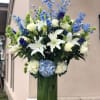 The vase alone is over a foot tall. This abundant arrangement of