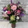  Beautiful mix of pink, lavender, purple, white and green flowers. Vase