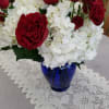 Hydrangea and red roses arrangements