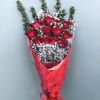 This arrangement includes 12 long stem Red Roses that are between 2