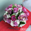 This piece includes, Roses, Orchids and Hydrangeas. 