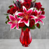 Cupid&#039;s Floral Arrangement blossoms with roses and Stargazer lilies to display your