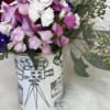 Cans full of love decorated with fresh seasonal flowers.

With our special and
