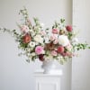 A stunning Arrangement designed in a large urn. This is a popular