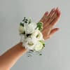 Make your special occasion extra elegant with our White Corsage, featuring white