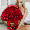 75 Fresh Roses arranged in our signature hat flower box.
