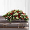 The Sincerity Casket Spray is a wondrous presentation of fresh color and