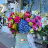 Experience a burst of vibrant colors with our Vivid Blossom Bouquet, a