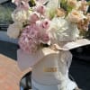 Delight her heart with our Romantic Blossom Box, a charming arrangement featuring