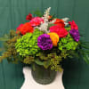 A playful explosion of color, the &quot;Skittles&quot; arrangement radiates joy with its