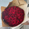 Red Roses Bouquet Wrapped in Brown Floral Paper.