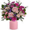 Sweet as can be, this pastel rose bouquet--arranged in a delightful frosted