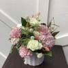 This beautiful arrangement is a great color palette of mixed pinks, peaches