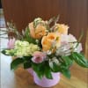 Beautiful peach roses, pink hydrangeas, yellow stock, pink ranunculus 