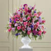 Extravagant, beautiful and comforting, this generously scaled arrangement eloquently expresses your sympathy