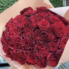 A bouquet of premium red roses is an elegant and not banal