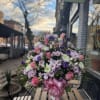 Heartfelt Tribute Pastel Floor Basket.This charming pastel tribute radiates calm and hope