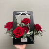 Red pallet flowers in a black box. (Custom colors available upon request)