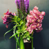 STRONG with Finesse 
Lisianthus... Calla Lillies...Cymbidium Orchid....Succulents. 