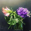 Calla lilies, stock, succulent, lily grass.
We use flowers that are available at