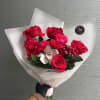 Red roses with orchid and hypericum.