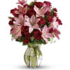 Lovely reds and pinks come together in this lavishly romantic anniversary gift.