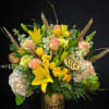 Large, lush arrangement to celebrate your special day!