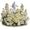 An elegant display of faith and grace, this beautiful arrangement will comfort