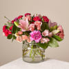 Let your love bloom. Roses, lilies &amp; carnations in a glass vase