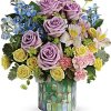 This alluring bouquet features lavender roses, light yellow spray roses, pink alstroemeria