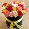 This gorgeous deluxe hatbox full of 24 beautiful mixed color roses makes