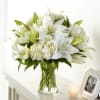 Vase arrangement of Hydrangeas And Lily&#039;s With Greenery.